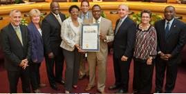 Commissioner Jordan with colleagues and Lucas