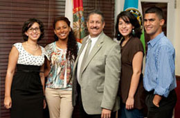 Commissioner Diaz congratulates recipients of his annual scholarship opportunity.