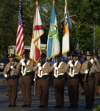 Officers with flags