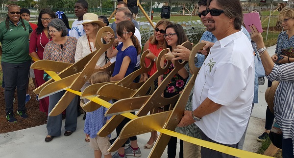 Debbie Curtin ribbon cutting