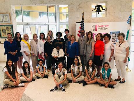 Congresswomen Ileana Ros-Lehtinen and Gwen Graham, along with the Miami-Dade County Commission for Women members, pose with honoree Congresswoman Carrie Meek, her daughter Lucia Davis-Raiford, and others