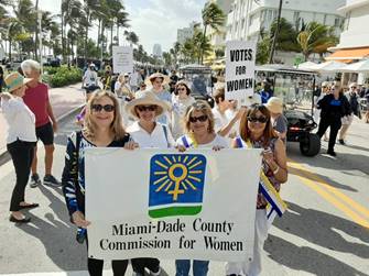 Commission for Women participate centennial parade