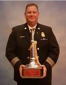 Chief Dave Downey with Florida Fire Chief of the Year award