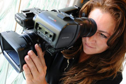 Woman with video camera
