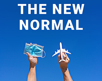 Person holding a facemask and a toy airplane