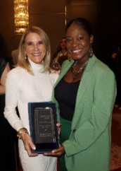 Commissioner Vicki L. Lopez receiving award