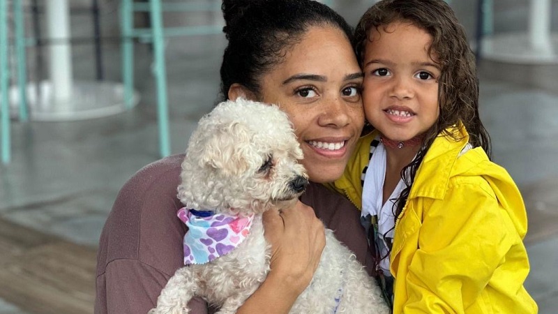Mother and daughter with their new adopted dog.