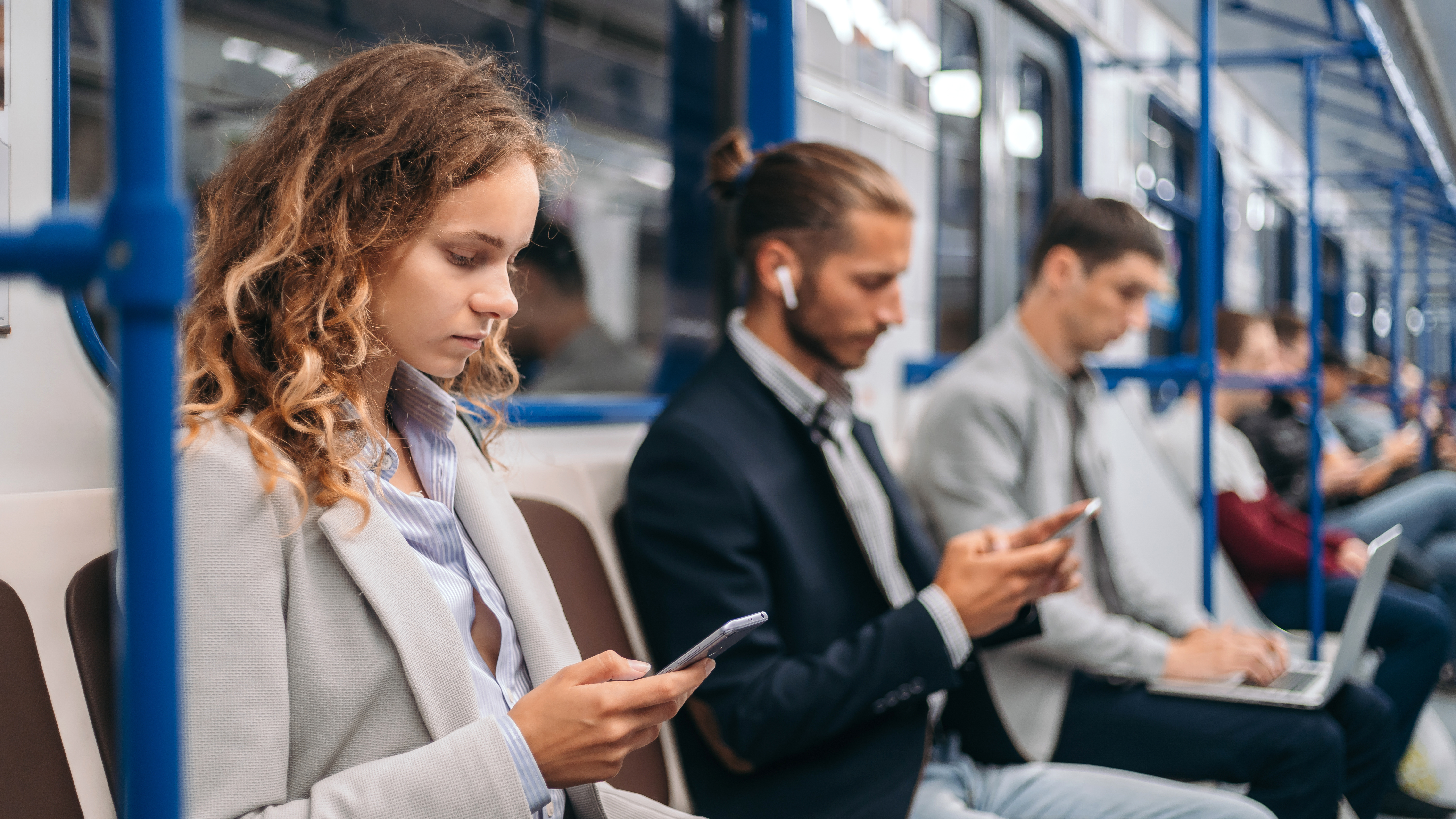 Image multiple young people on a train