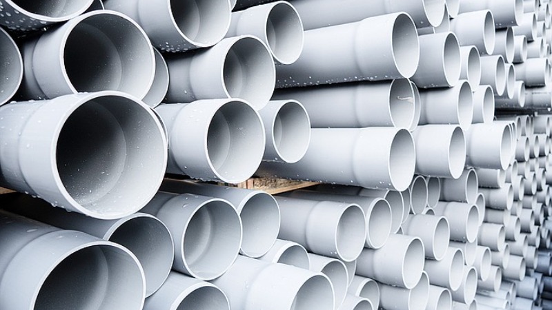 image of several stacked pvc pipes