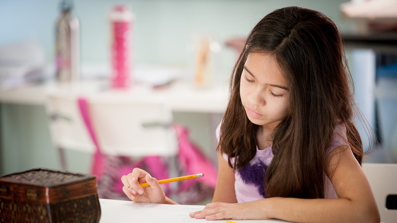 Girl doing homework.