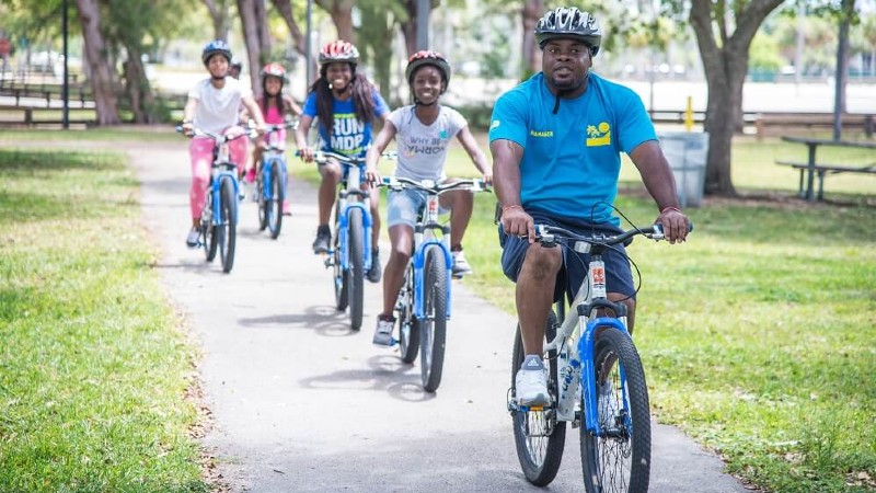 Image of family bike riding