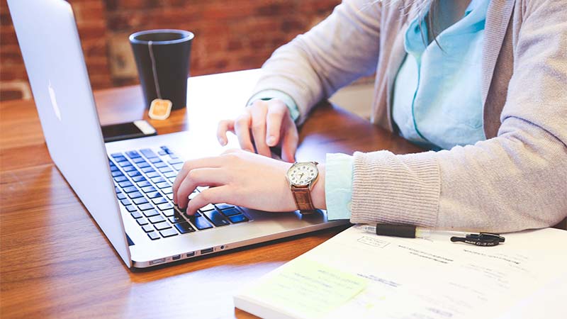 woman browsing on a laptop