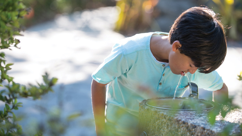 Boy drinking water