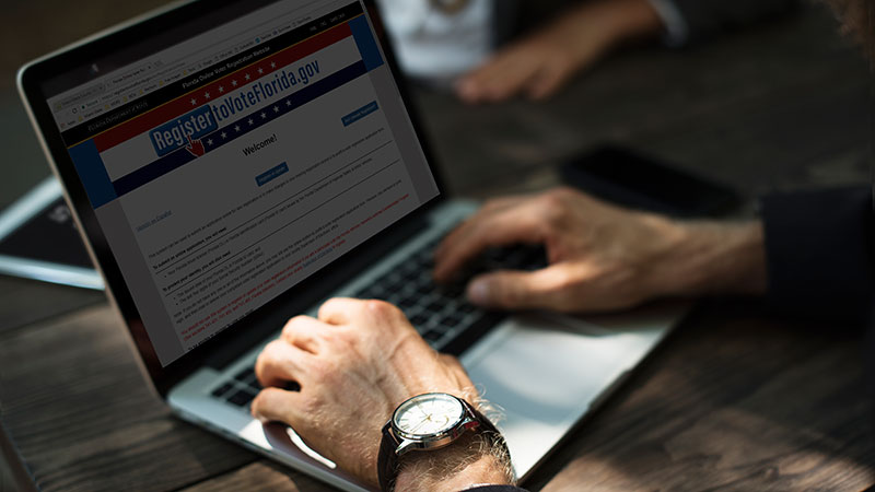 Man registering online to vote.