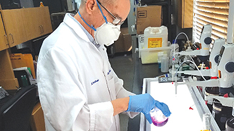 scientist testing water