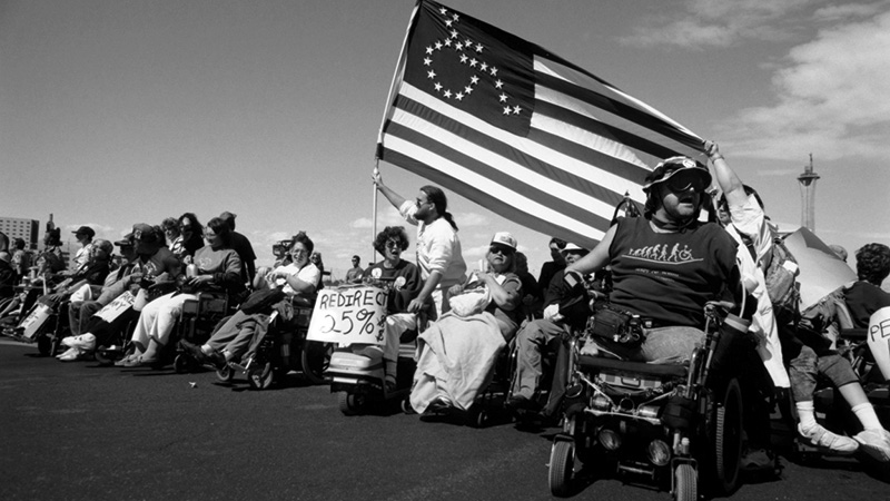 People with disabilities gathered together celebrating