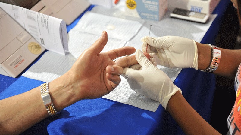 Individual receiving medical screening