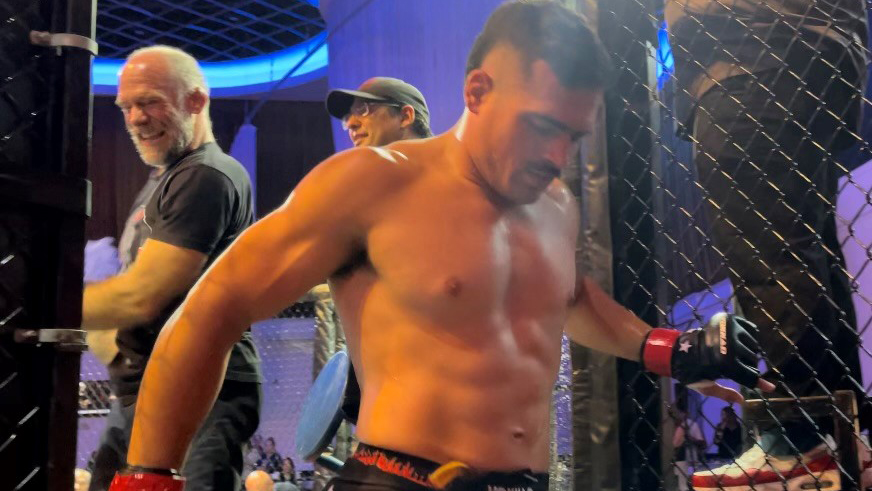 MMA fighter Luis Hernandez Jr stepping out of the ring