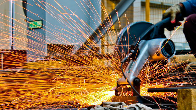 a circular saw emitting sparks 