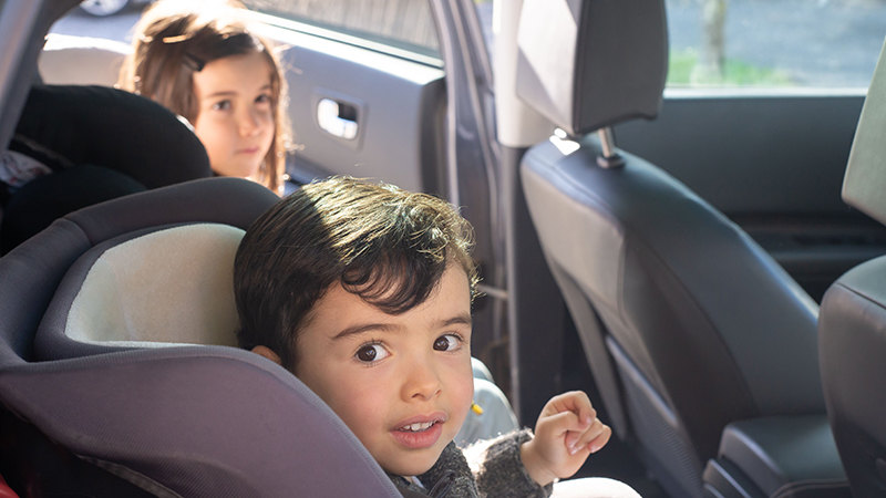 Children in the back seat of a car