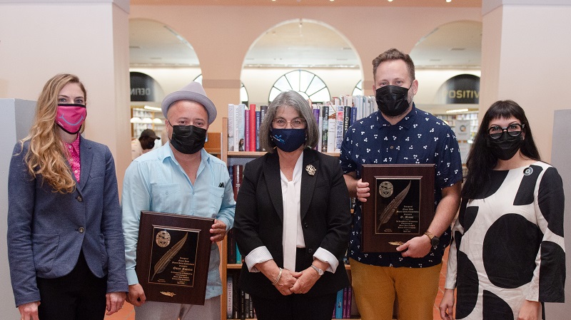 Image of the Mayor along with this year's award recipients. 