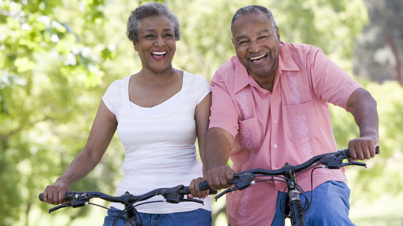 older couple riding their bikes