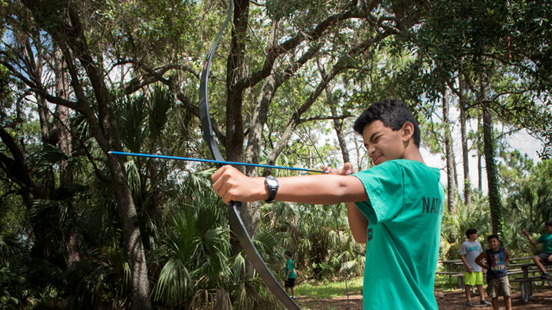 A boy shooting an arrow