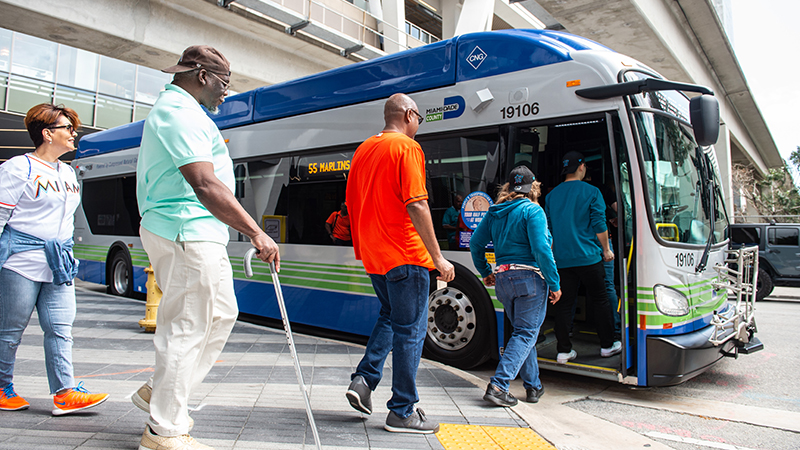 People boarding a Miami-Dade County bus