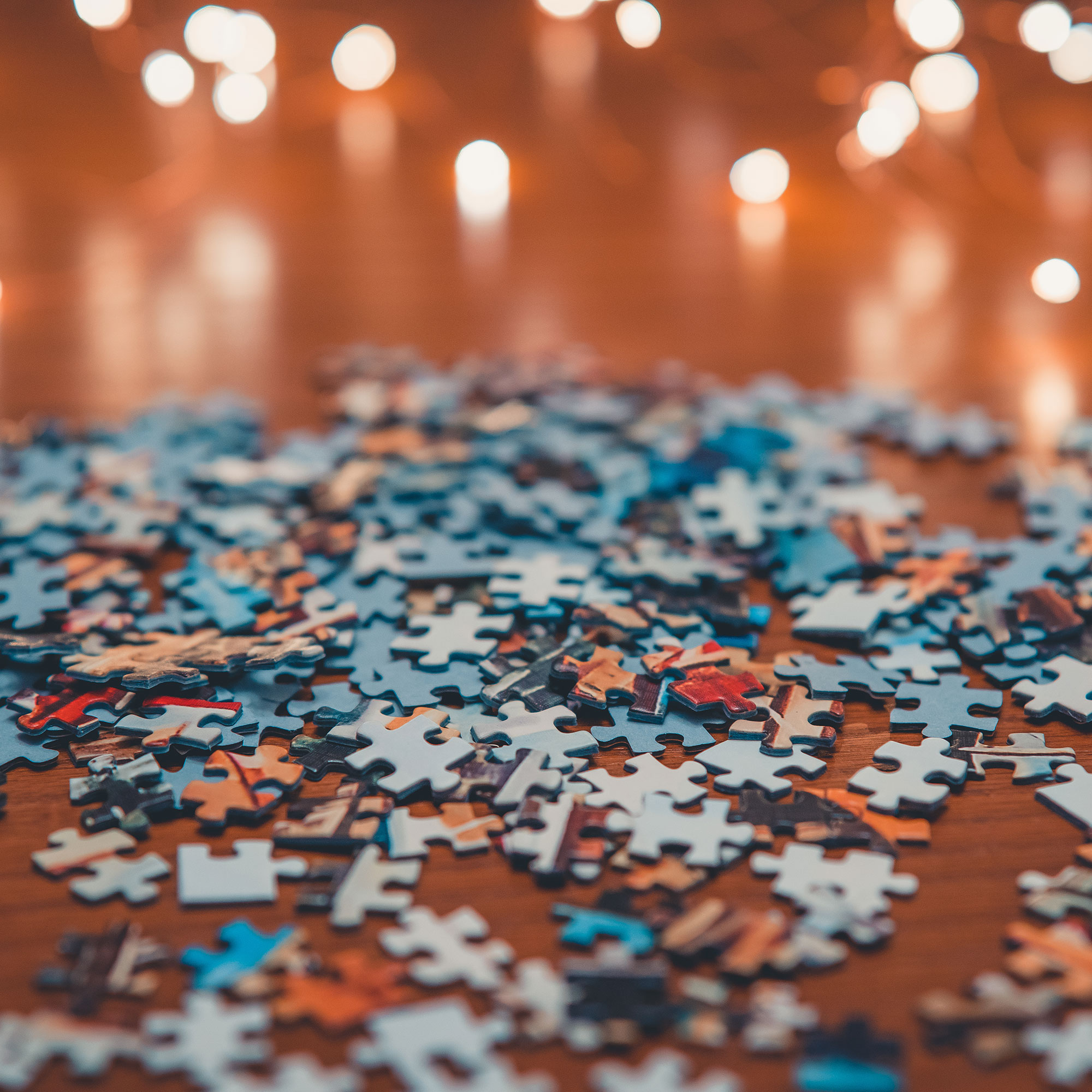 many colorful jigsaw puzzle pieces