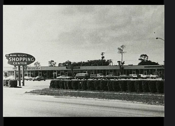 black and white photo of shopping center, circa the mid-1950s