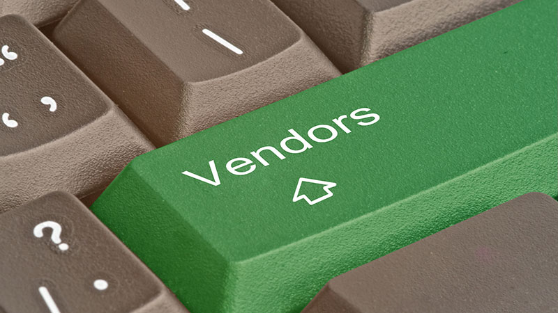 keyboard with a green enter-key that reads VENDORS